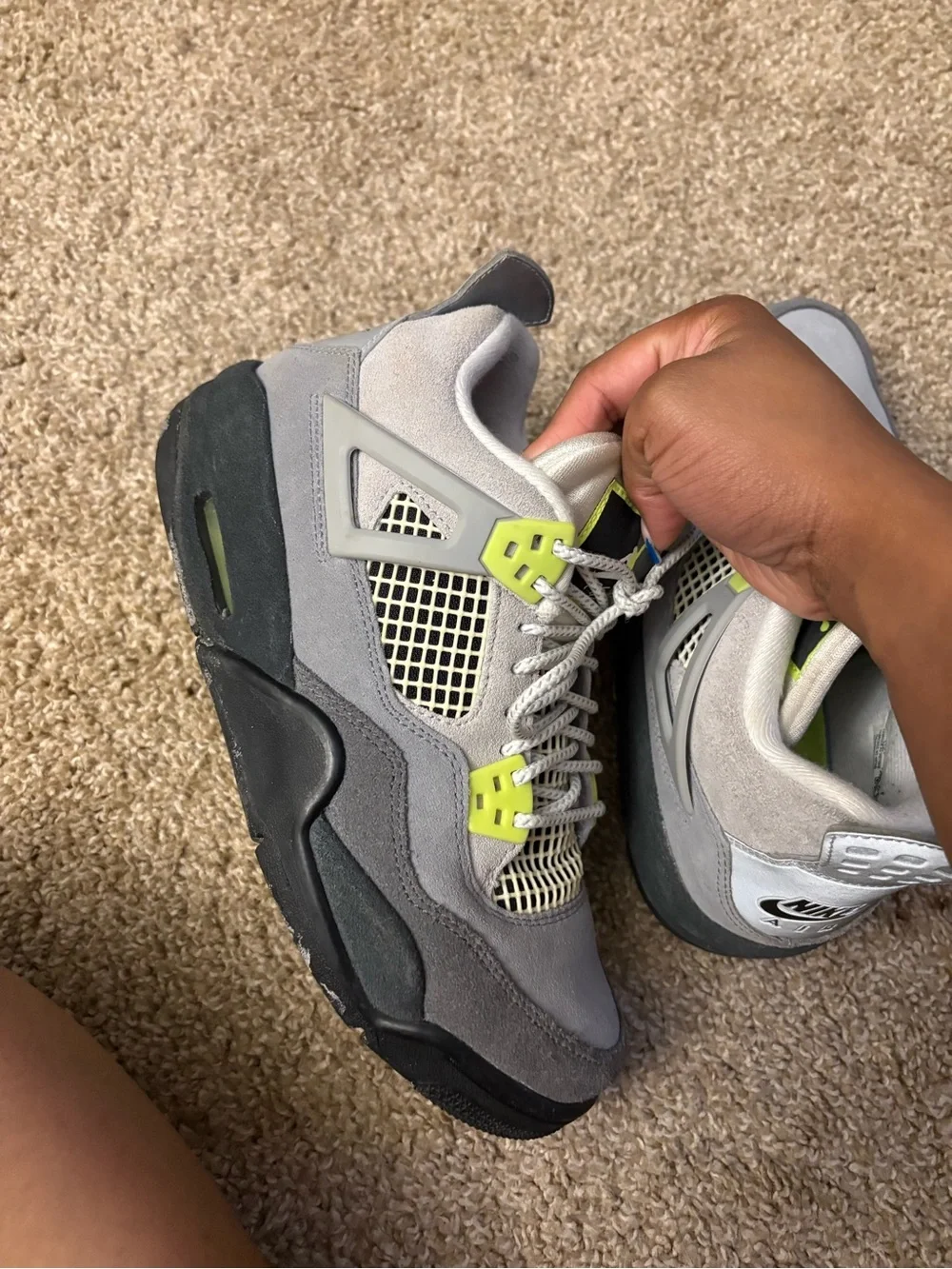 Retro 4 grey and neon green Jordan’s